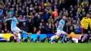 Carlos Tevez fires Manchester City into an early lead against Watford