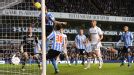 Coventry's Carl Baker tries in vain to prevent Clint Dempsey's header putting Tottenham 3-0 up