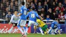 Elliott Bennett nets the opener for Norwich against Peterborough