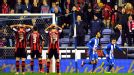 Wigan celebrate after drawing level through Jordi Gomez
