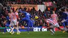 Jon Walters heads through his own net against Chelsea