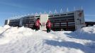 Stoke City fans make their way to the Britannia Stadium in the snow