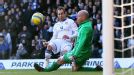 Luke Varney fires Leeds into the lead against Tottenham