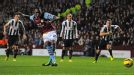 Christian Benteke slots home a penalty for Aston Villa to reduce the arrears