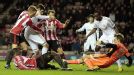 Danny Graham sees a late chance go begging as the Sunderland defence close him down