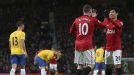 Wayne Rooney celebrates with Shinji Kagawa after netting the equaliser against Southampton