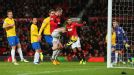 Wayne Rooney turns home his second goal of the night to put Manchester United 2-1 up