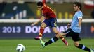Spain forward Pedro fires the first of his two goals in the 3-1 victory over Uruguay