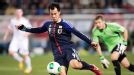 Shinji Okazaki scores his second goal for Japan in the 3-0 defeat of Latvia