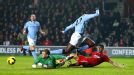 Manchester City goalkeeper Joe Hart makes a save but Jason Puncheon was on hand to score the rebound