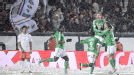 St Etienne celebrate in the snow after Mathieu Bodmer scored in their 4-1 win over Montpellier