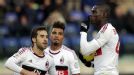 Mario Balotelli scored a penalty to give Milan a share of the spoils