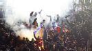 PSG fans celebrate after Ezequiel Lavezzi scored their second at Valencia