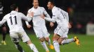 Mousa Dembele celebrates his super strike against Lyon in the Europa League