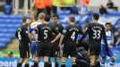 Reading striker Pavel Pogrebnyak is shown a red card against Wigan.