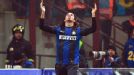 Inter Milan's Ezequiel Schelotto celebrates after scoring the equaliser in the Milan derby