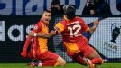Burak Yilmaz celebrates his goal with Didier Drogba