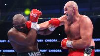 Tyson Fury defeats Derek Chisora by TKO to defend his titles
