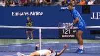 Djokovic climbs over net to check on shaken-up Medvedev