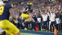 Roman Wilson makes two crucial catches as Michigan ties score