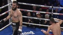 Artur Beterbiev claims victory after Callum Smith's corner stops fight