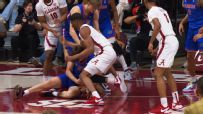 Alabama's Wague appears to elbow Florida player in back of the head