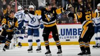 Penguins win 9-goal thriller to stay in playoff chase