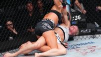 Kayla Harrison submits Holly Holm in her UFC debut