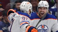 Oilers score twice in 45 seconds to extend lead