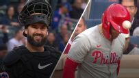 Bonk! Bryce Harper gets hit by catcher's throw back to the mound
