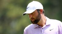 Scheffler slams club in frustration after poor bunker shot