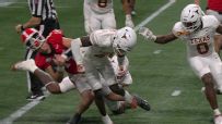 Texas' Andrew Mukuba lays the boom on punishing hit in OT