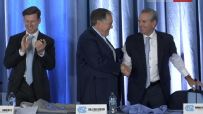 UNC AD pulls out a sleeveless suit jacket for Belichick intro