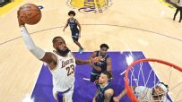 'Welcome back, LBJ!' LeBron follows massive dunk with chase-down block