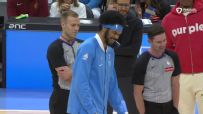 Jarrett Allen entertains crowd with backwards half-court shot