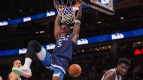 Anthony Edwards levitates on rim after ferocious dunk