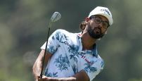 Akshay Bhatia hears a roar after chipping in for birdie