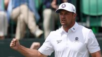 DeChambeau hears a roar after a birdie putt on Hole 1