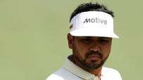 Jason Day chips in for birdie from the crowd