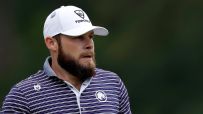 Tyrrell Hatton chips in for his first birdie of the day