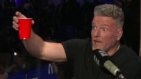 McAfee raises a cup ahead of the Colts' draft pick