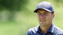 Spieth chips in to tie for second