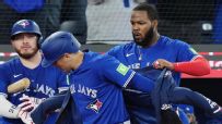Varsho mashes a grand slam for Toronto