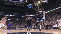 Ant goes baseline for a slick reverse layup