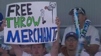 Wolves fans troll SGA with 'free throw merchant' sign