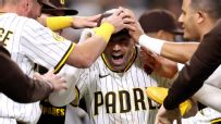 Padres walk off in extras on Marlins' wild pitch