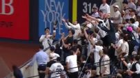 Fan interference helps end 6th inning for Yanks