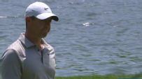 Rory goes over the water then drains long birdie putt on 17
