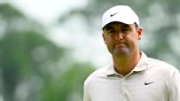 Scheffler makes fine eagle for share of lead