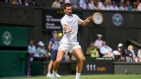 Djokovic finishes long rally to take 2-1 set lead over De Minaur